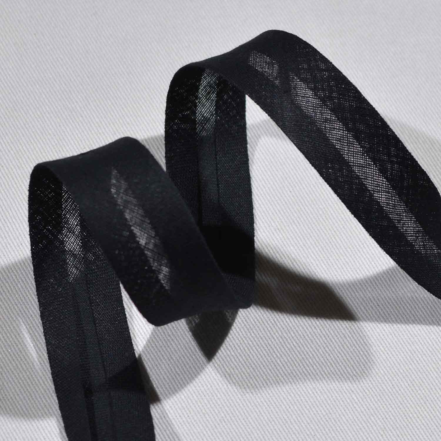 Schrägband 20mm Baumwolle uni - Schwarz 1001 Schrägband 20mm Baumwolle uni - Schwarz 1001
